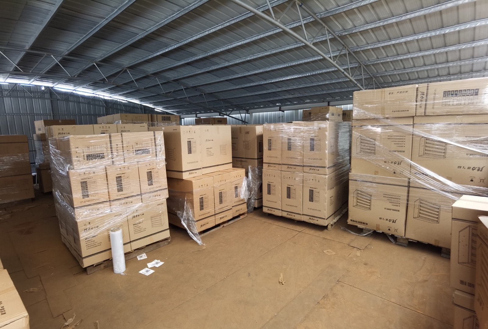 Packed product cartons prepared for dispatch in warehouse